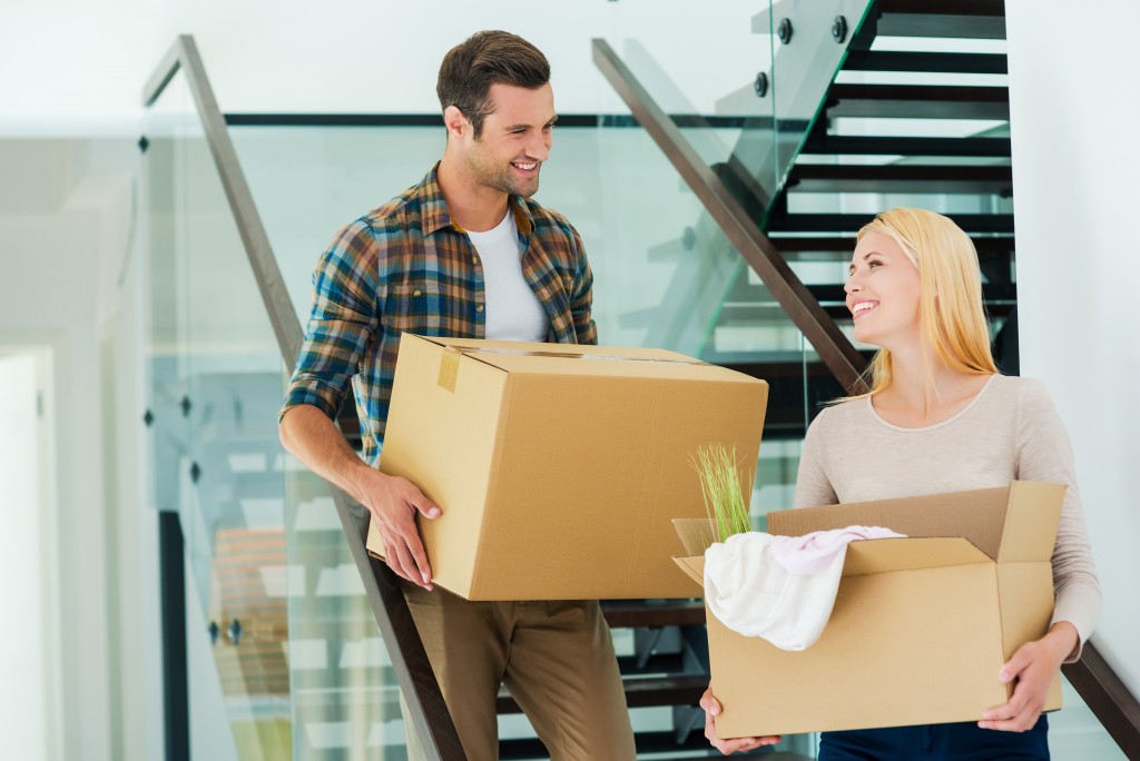 a couple moving to a new home