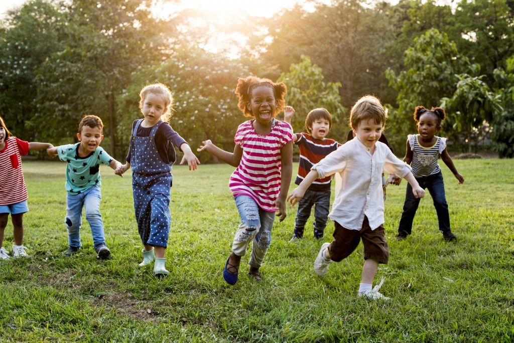 Kids playing at a field