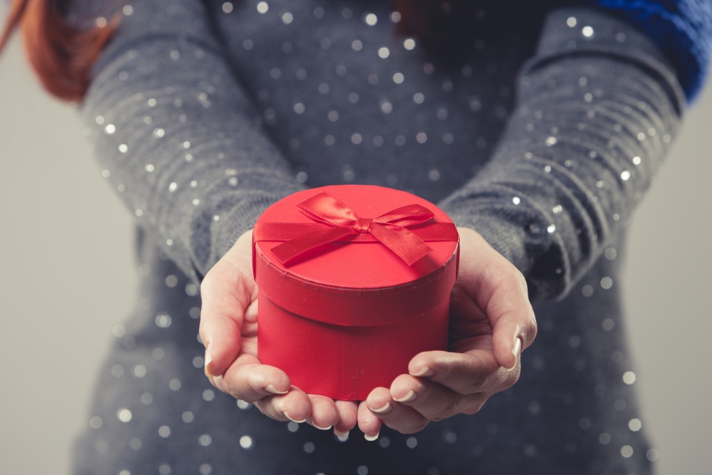 woman giving gift